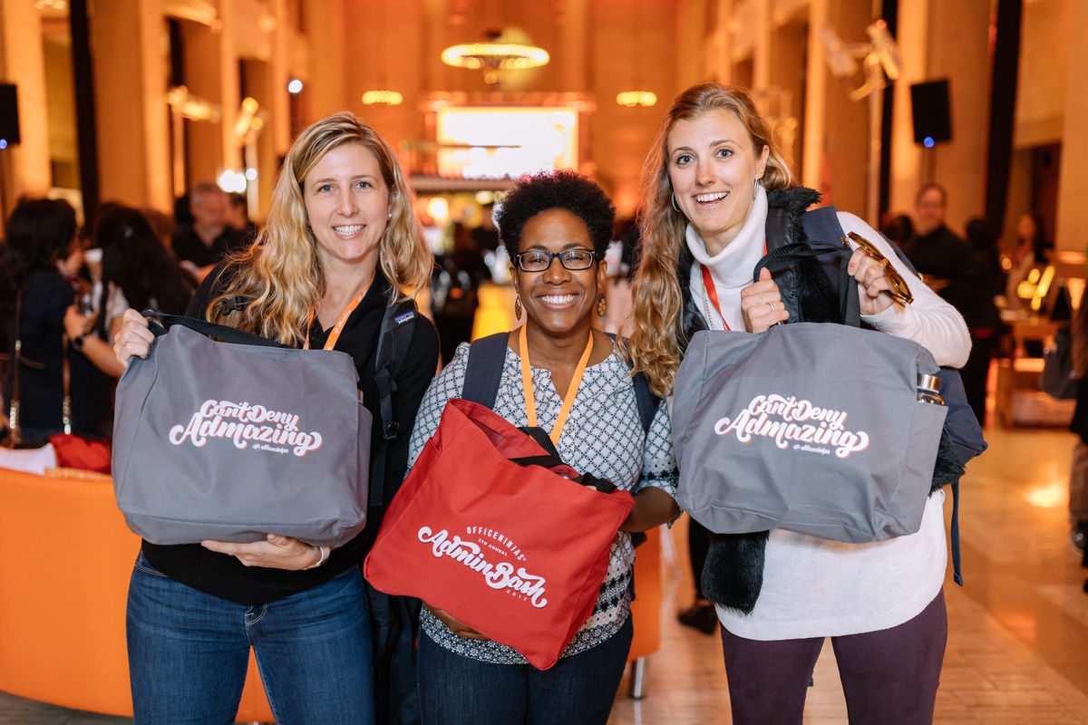 Admin professionals showing off their swag bags during OfficeNinjas 2017 5th Annual Admin Bash at San Francisco’s Bently Reserve.
