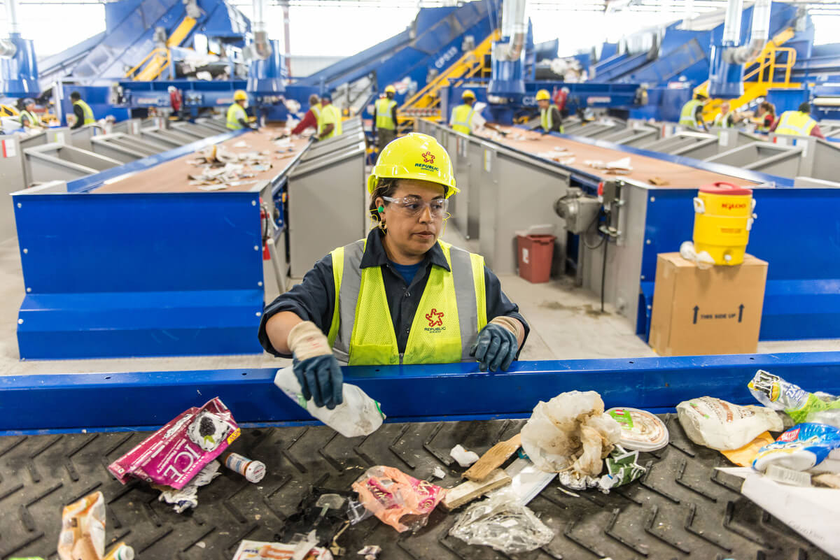 It takes teams of workers to remove the unacceptable waste sent to recycling plants.
