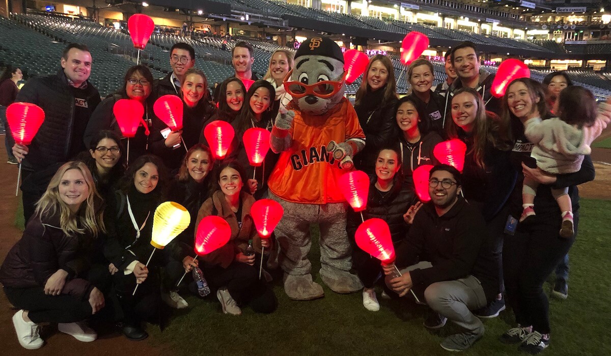 2020 OfficeNinjas All-Star Elaine Carbonell and the DocuSign team pose for a group photo at Oracle Park.