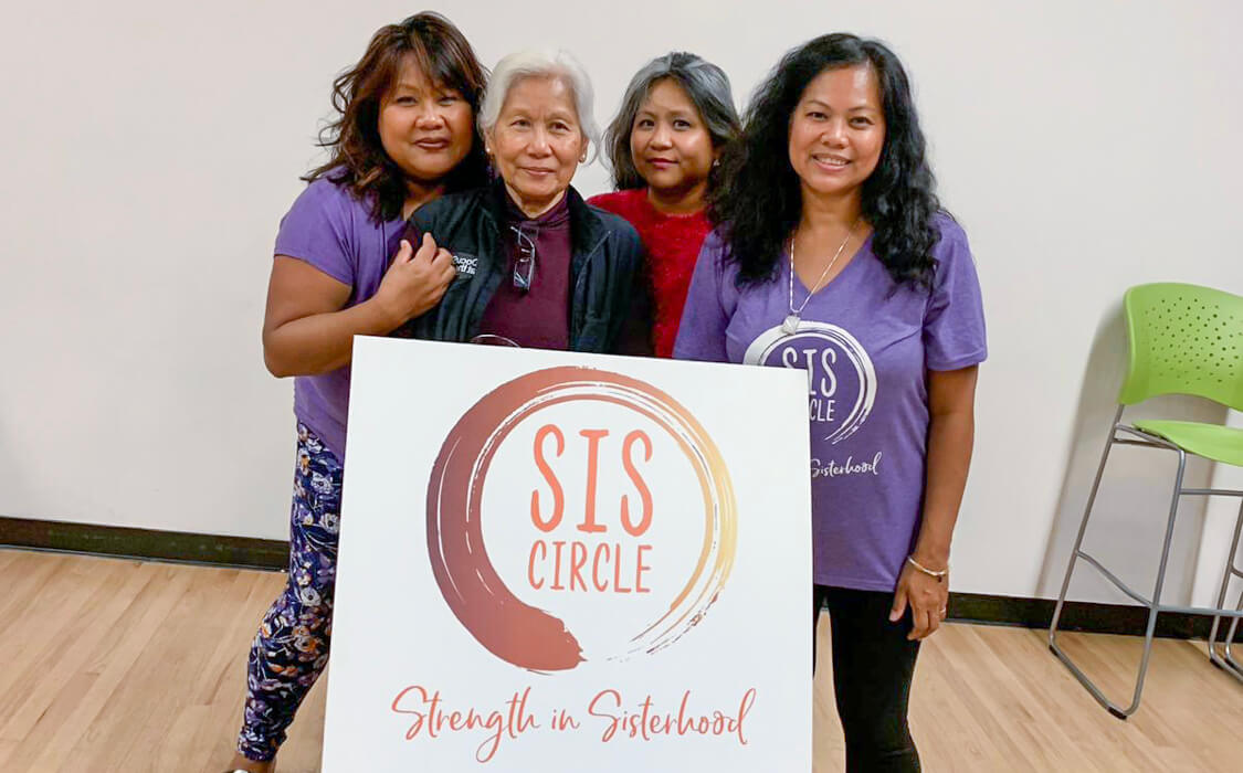 2020 OfficeNinjas All-Star Elaine Carbonell and her family pose for a photo during SIS Circle Resilience Summit.